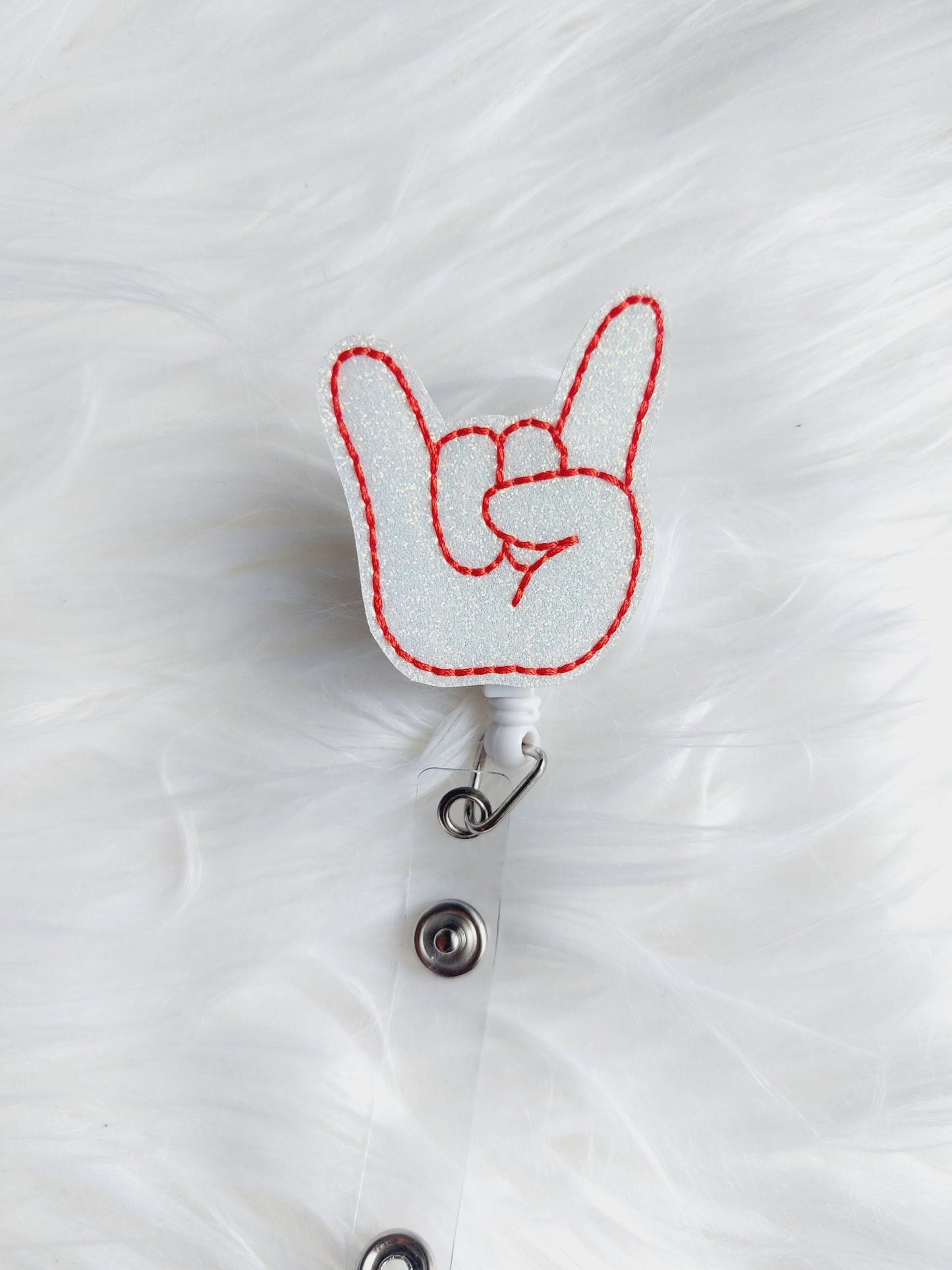 Rock On Hand Sign Badge Reel