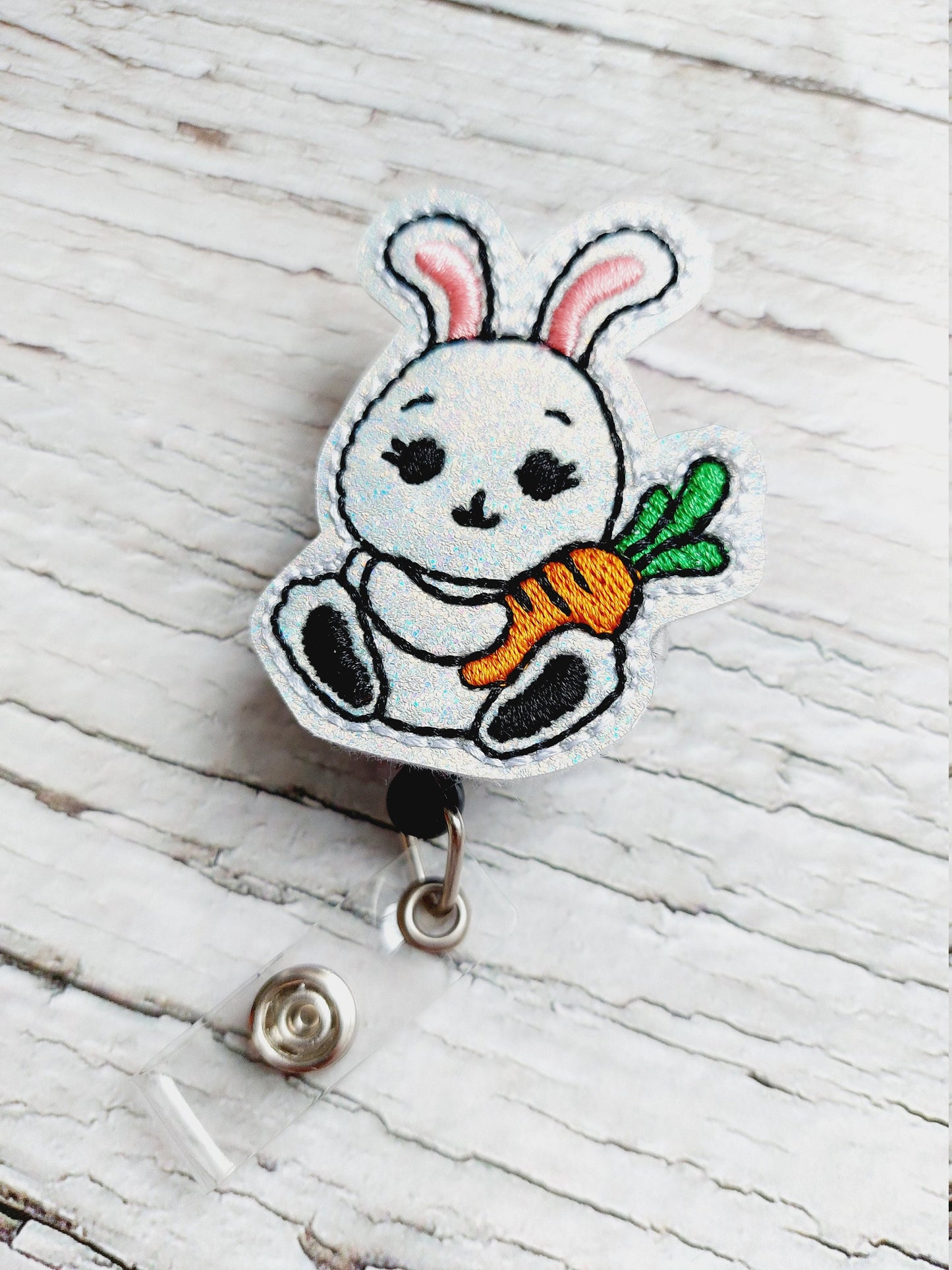 Bunny Holding Carrot Badge Reel