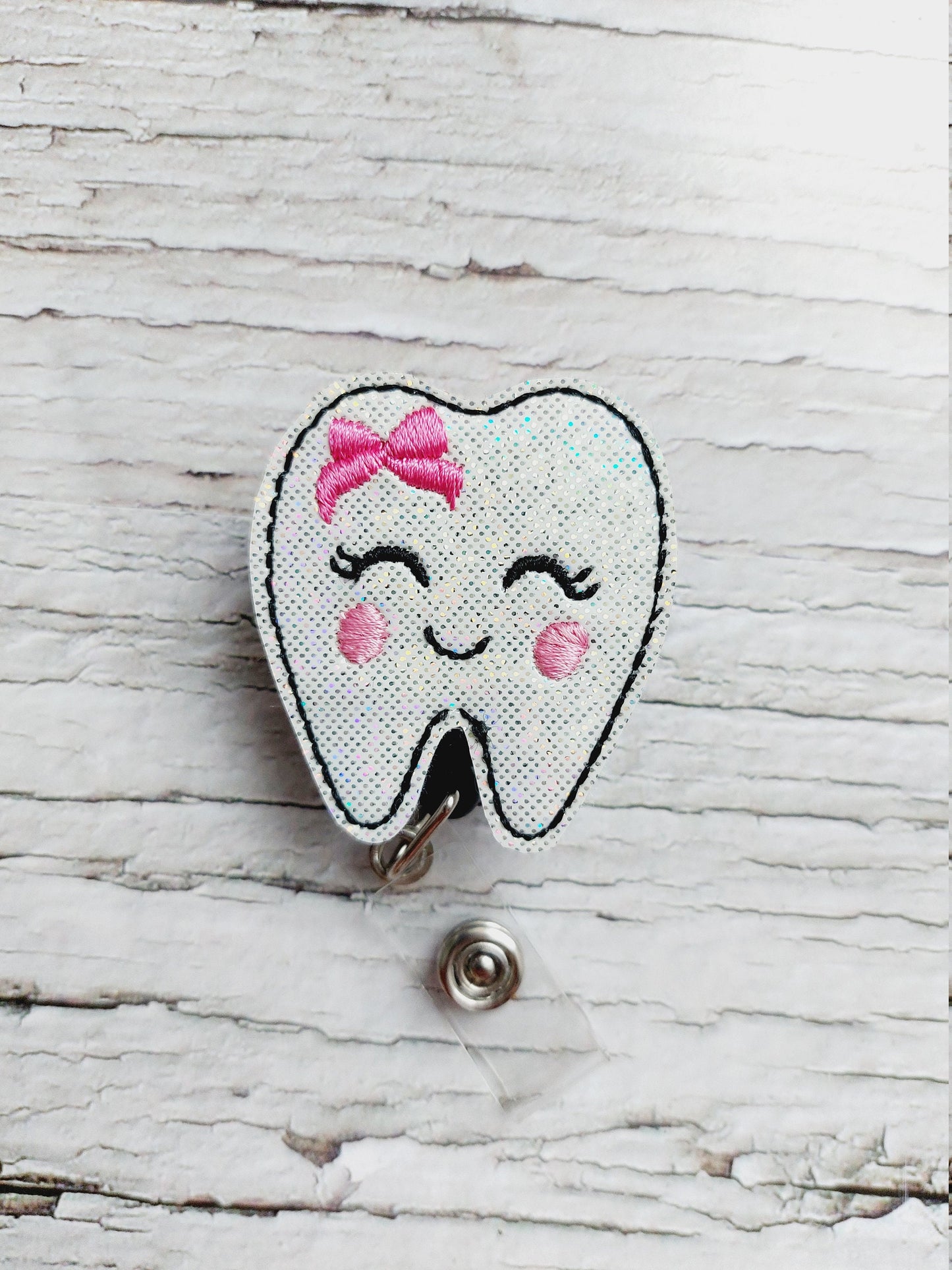 Tooth Badge Reel