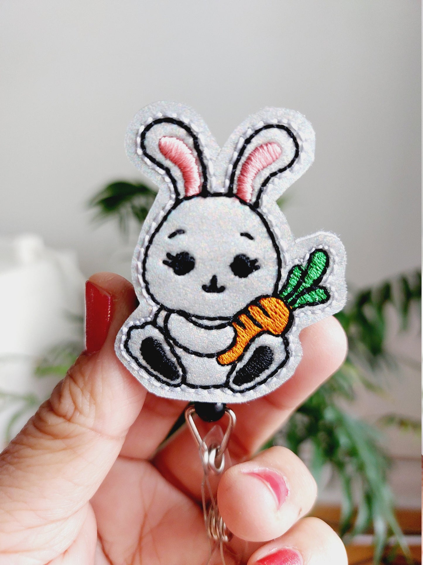 Bunny Holding Carrot Badge Reel