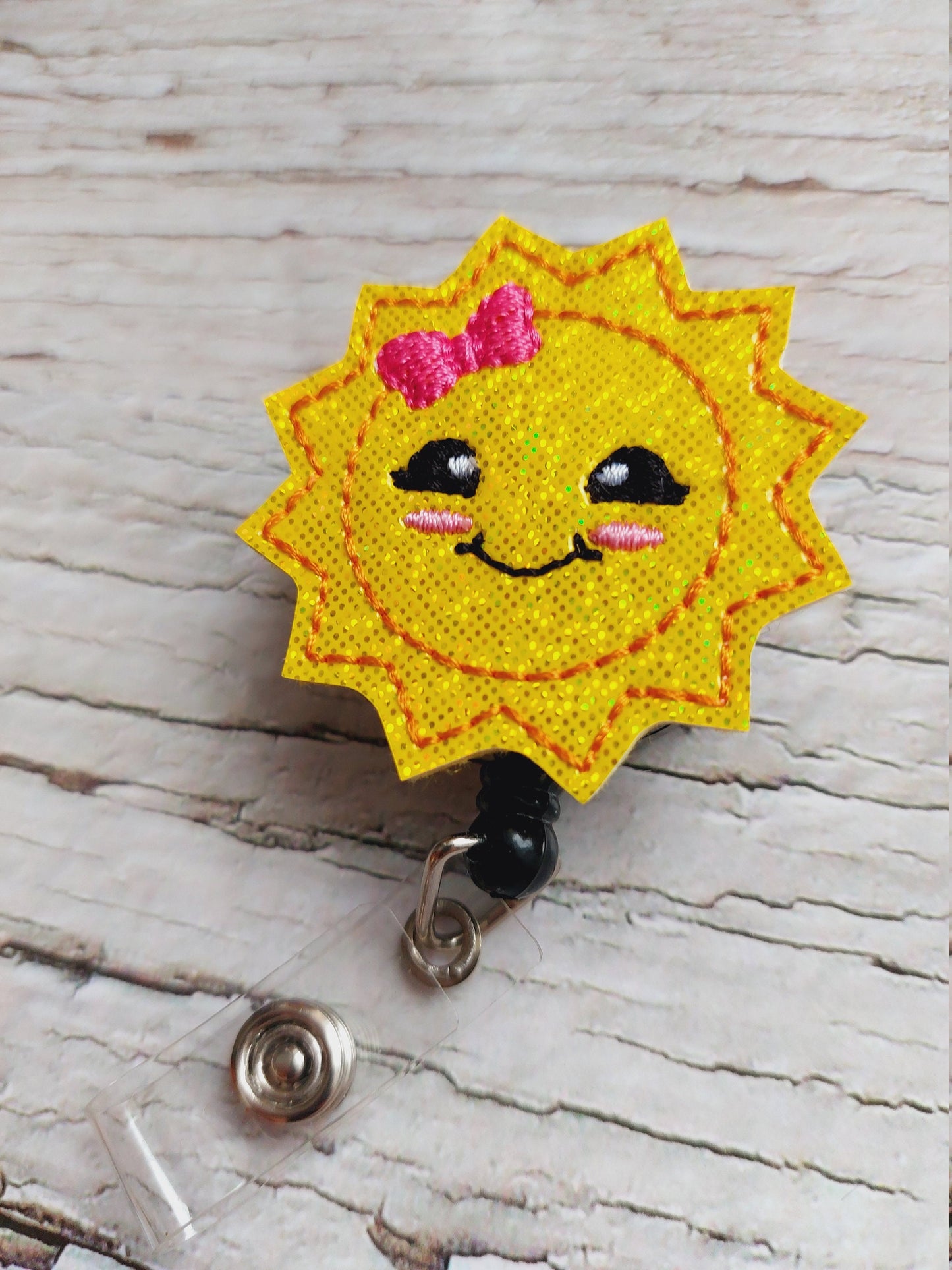 Happy Sun Badge Reel