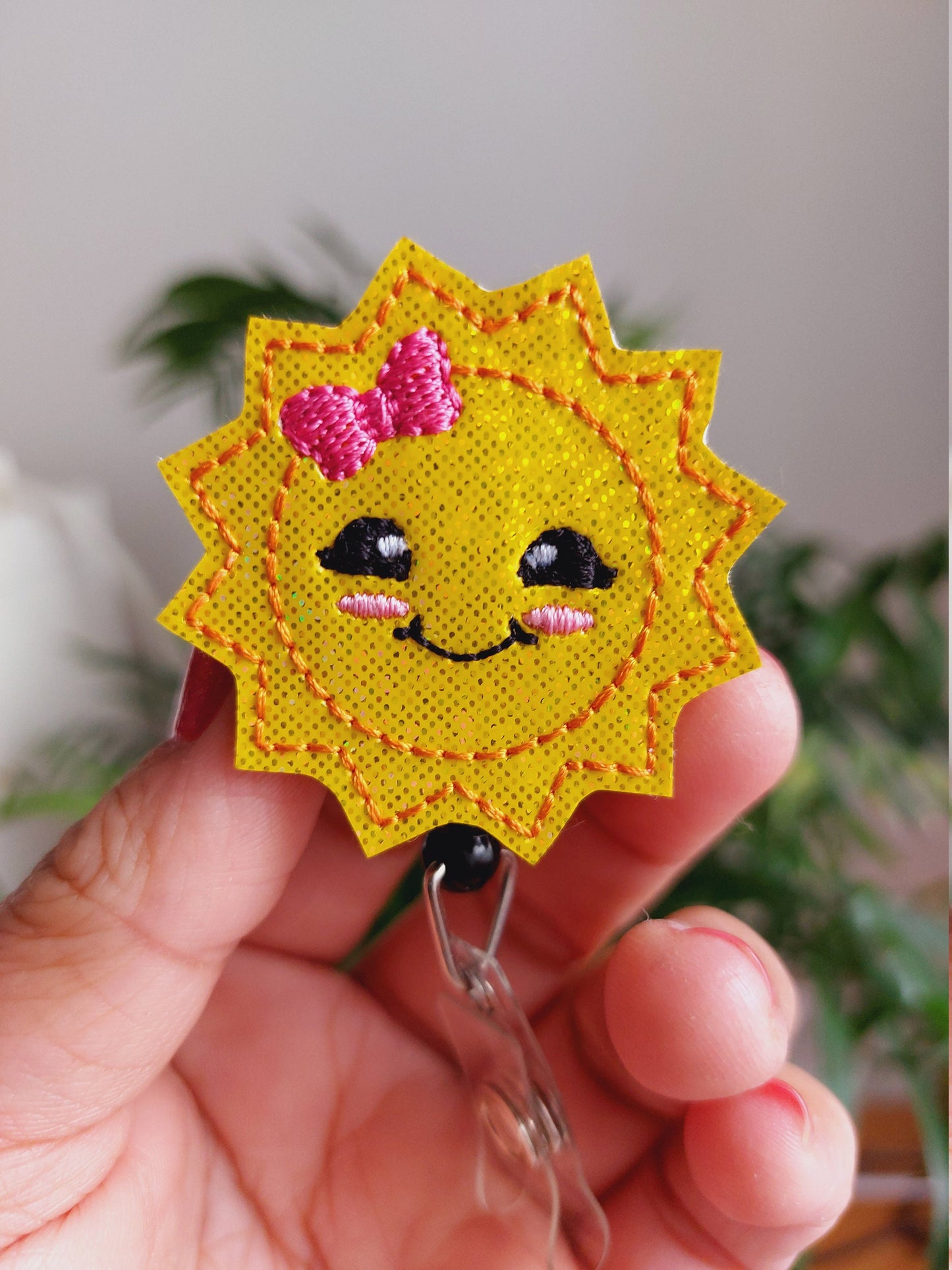 Happy Sun Badge Reel