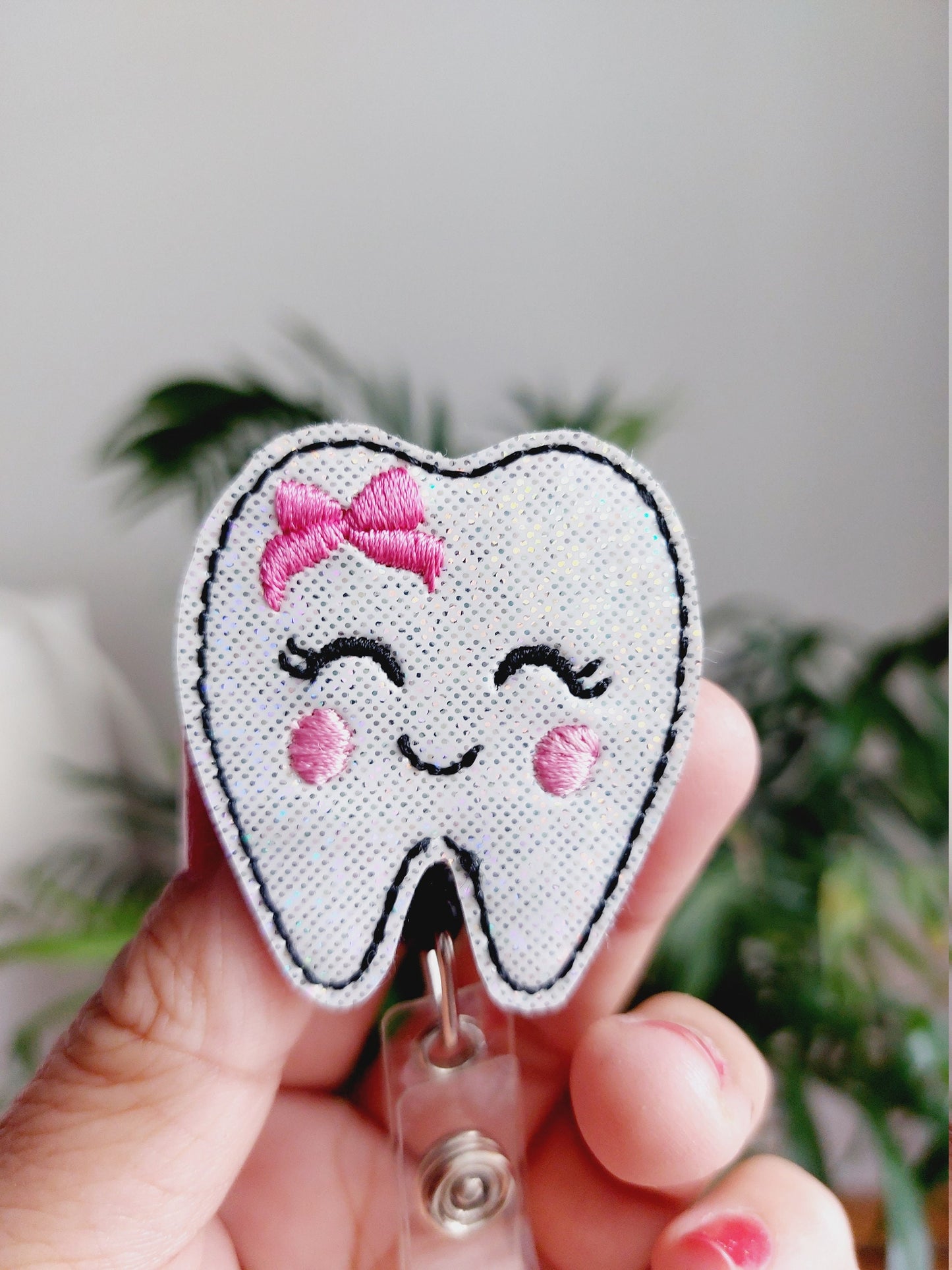 Tooth Badge Reel