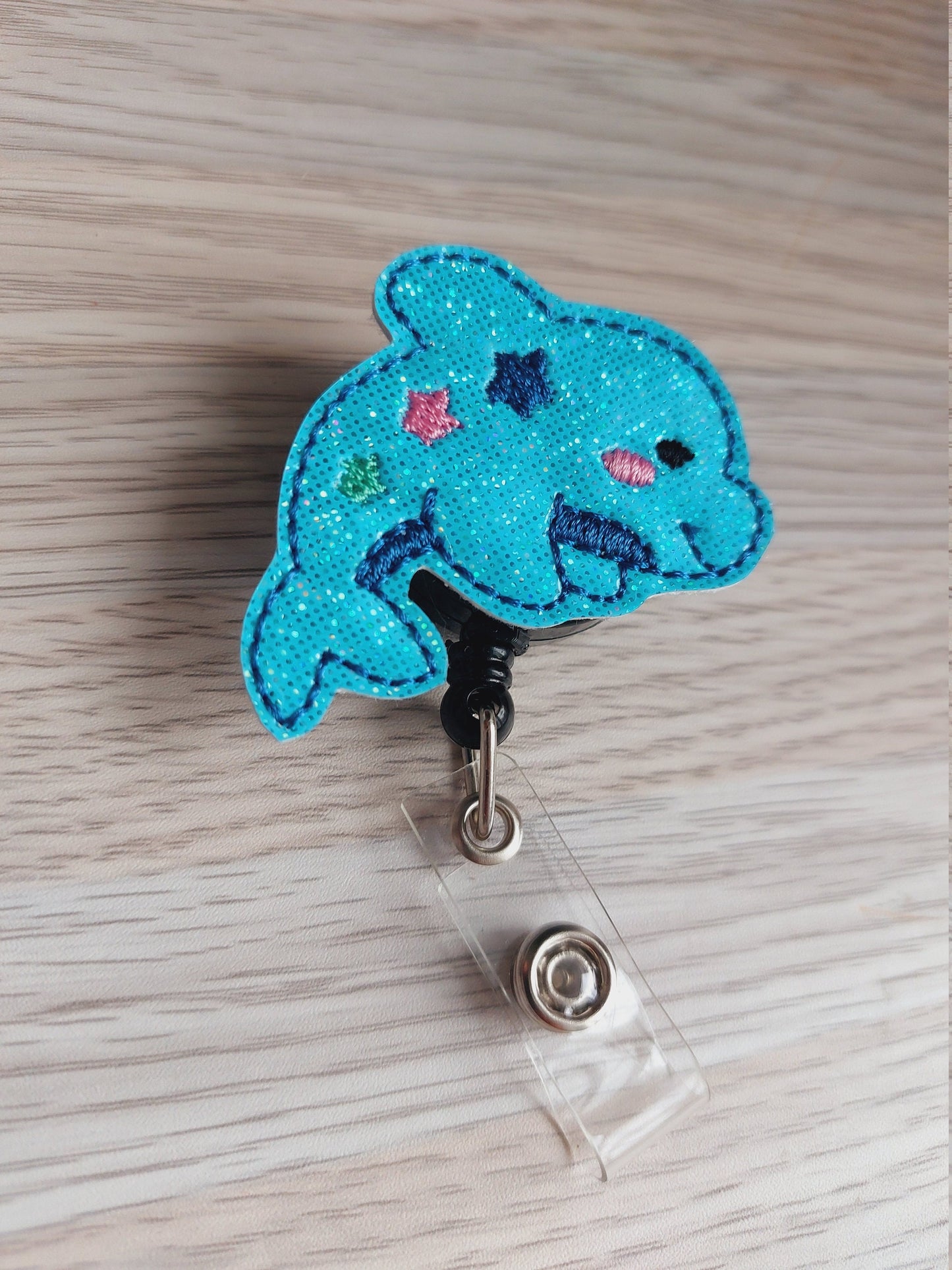 Dolphin Badge Reel