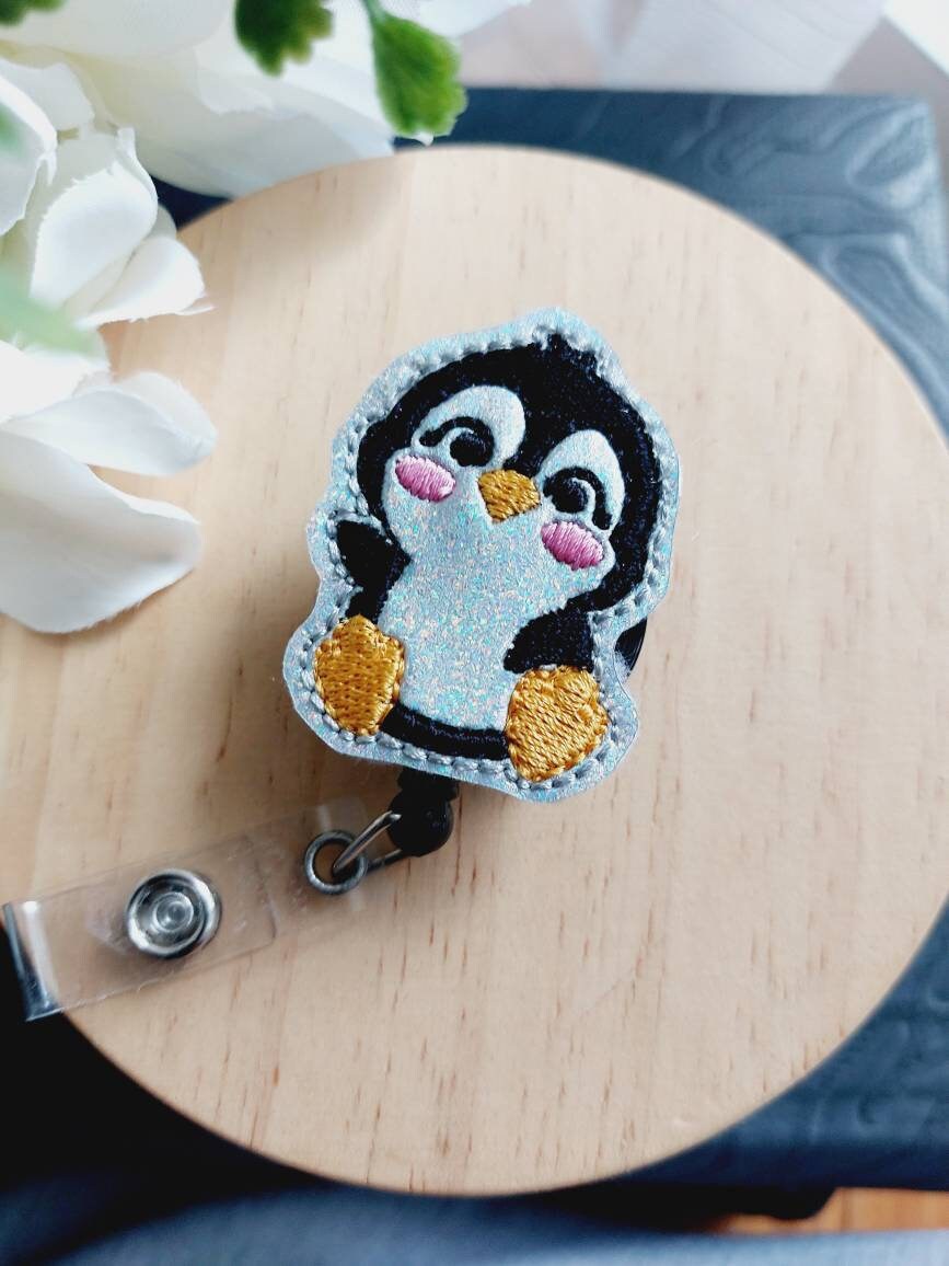 Penguin Badge Reel