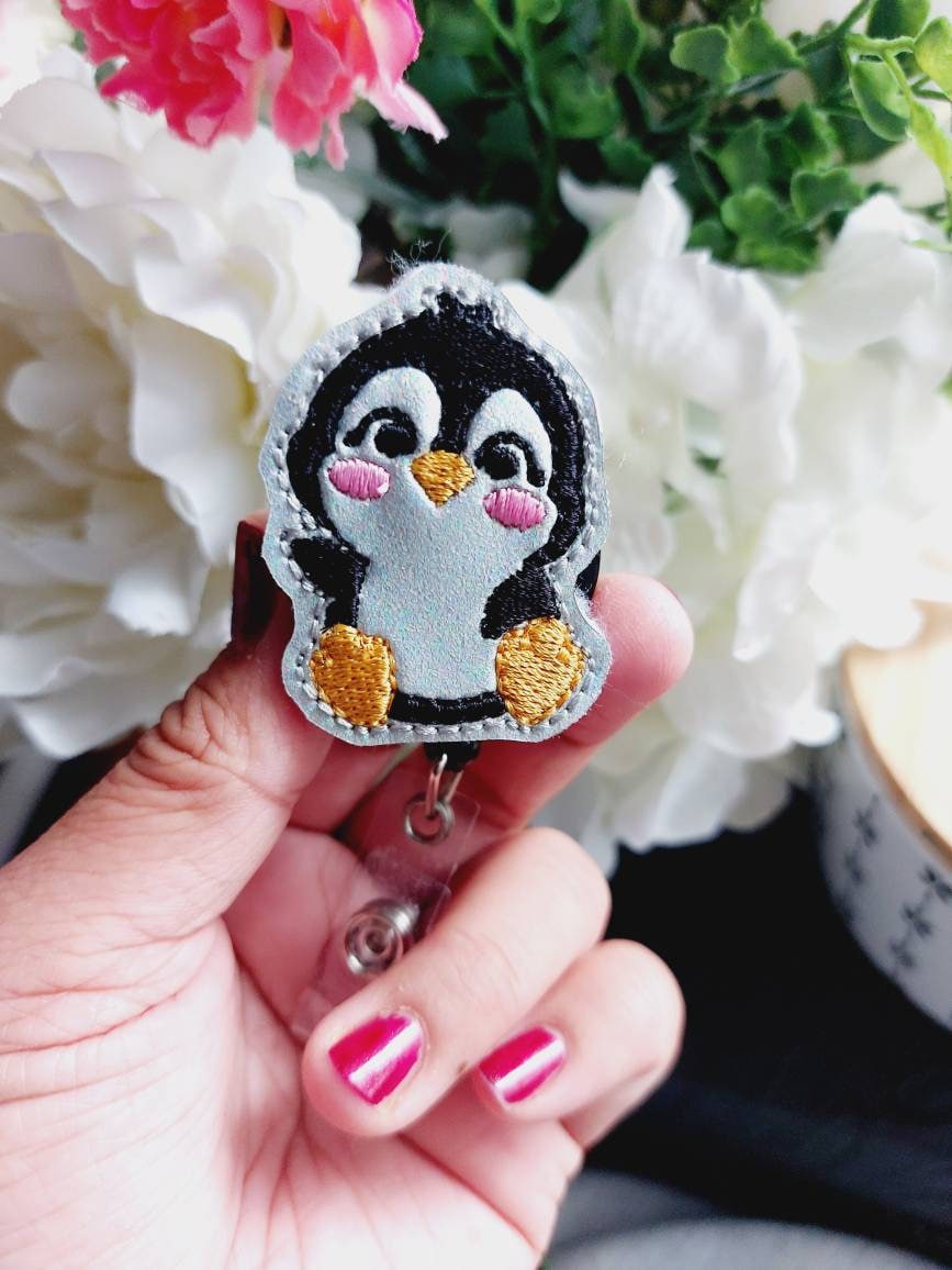 Penguin Badge Reel