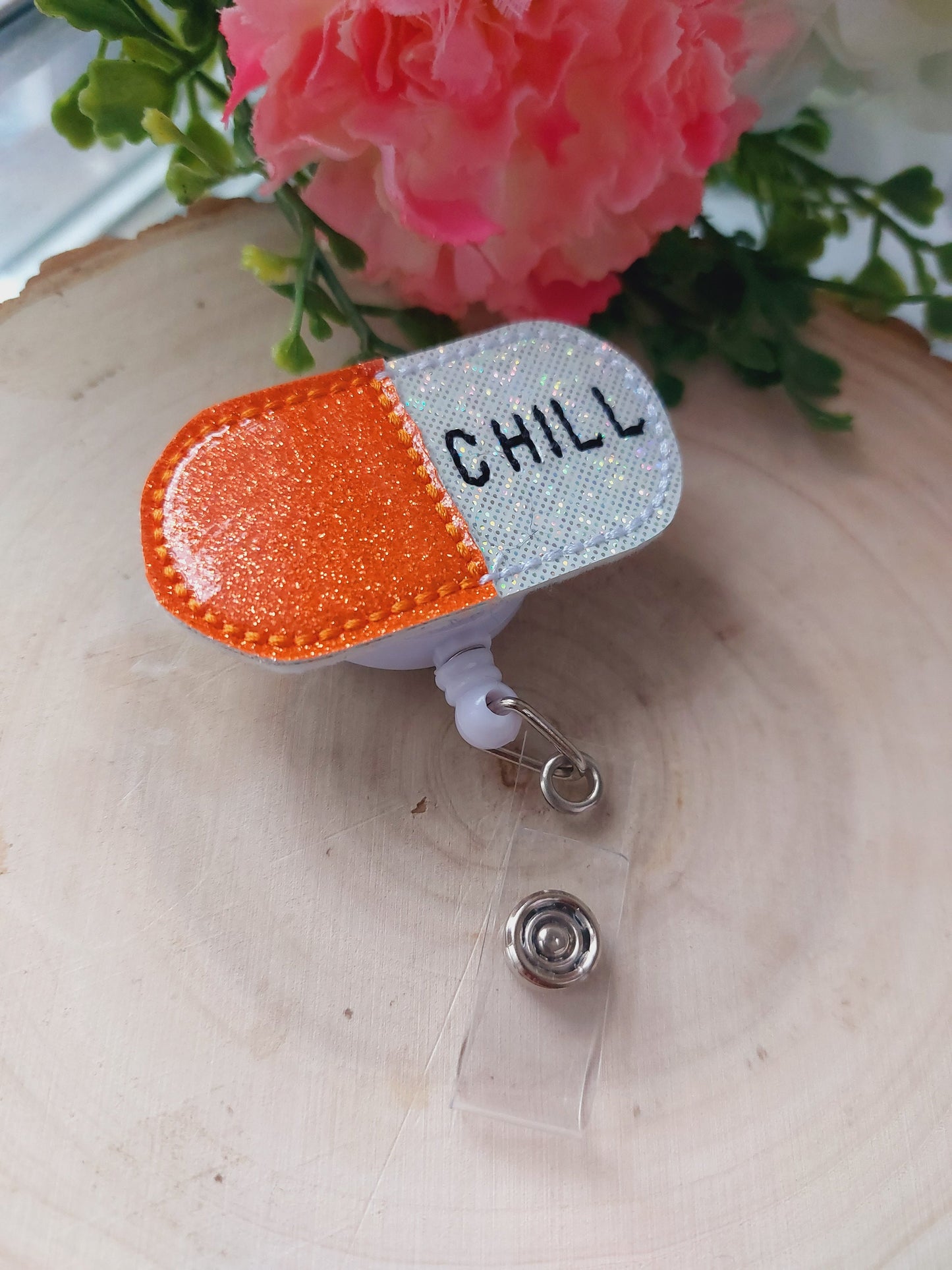 Chill Pill Orange Badge Reel