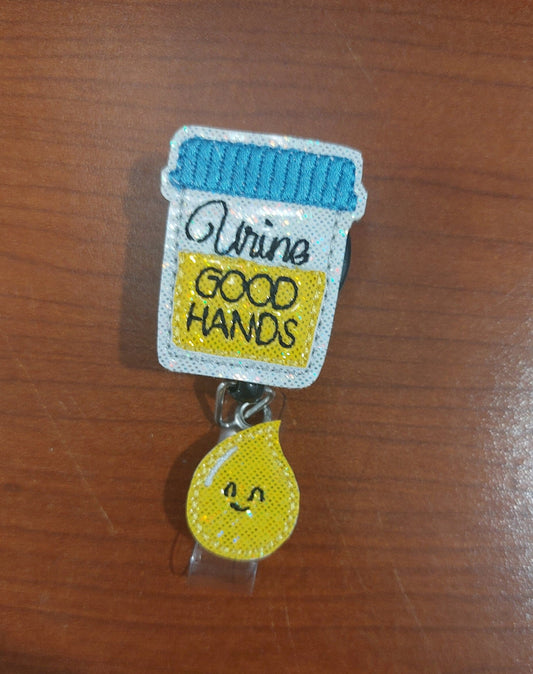 Urine Good Hands Badge Reel