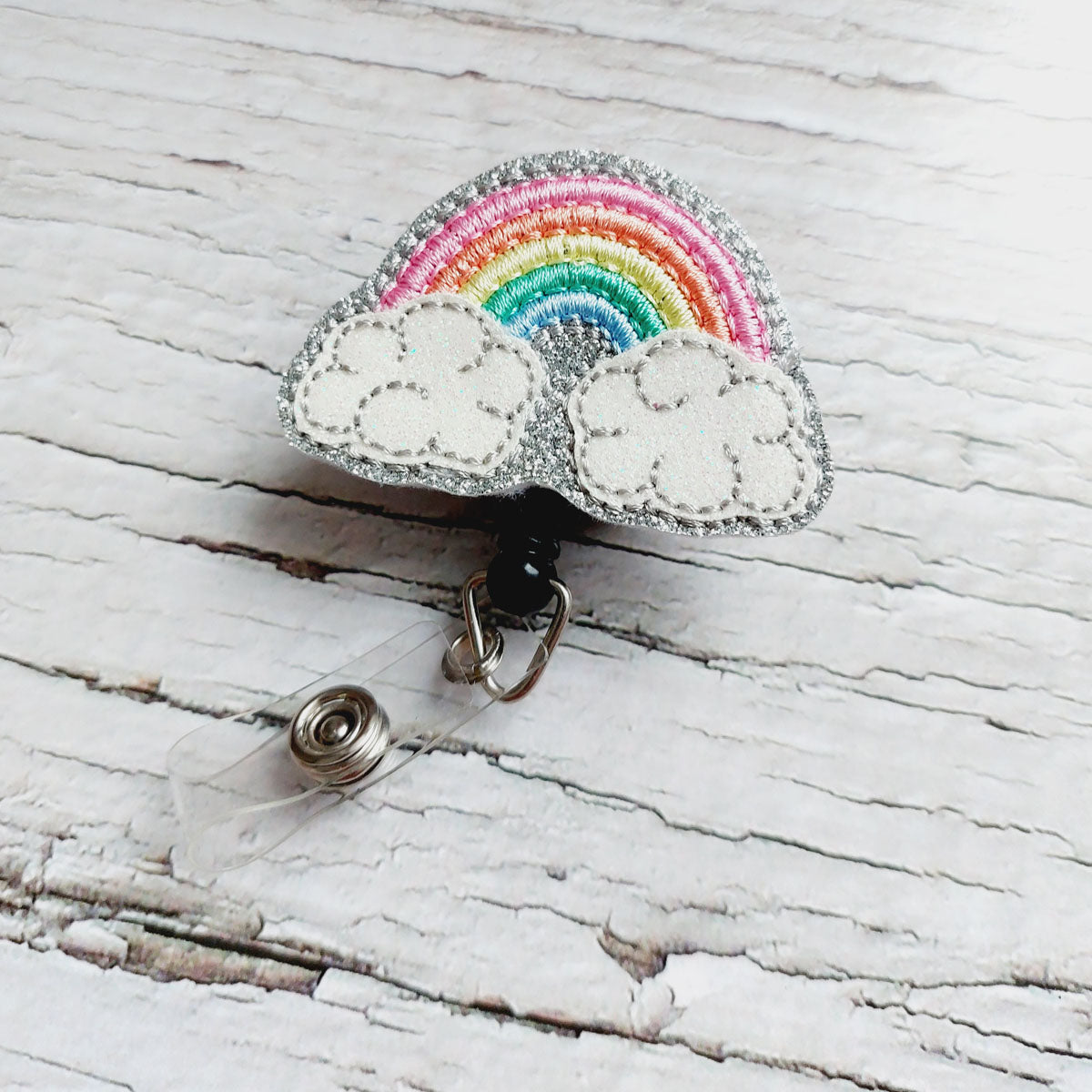 Rainbow With Clouds Badge Reel